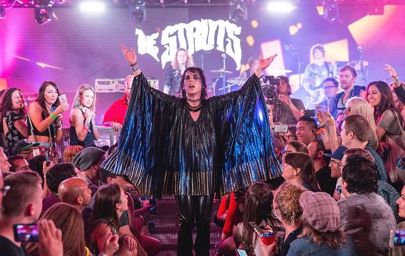"AUSTIN, TX - MARCH 17: Luke Spiller of The Struts takes the stage at the Bud Light Factory during the Interscope Showcase on March 17, 2016 in Austin, Texas. Bud Light Americas most popular and inclusive beer brand, and first time sponsor of South By Southwest® transformed Austins Brazos Hall into the Bud Light Factory, bringing exclusive performances to SXSW attendees from March 16-19. (Photo by Rick Kern/Getty Images for Bud Light)"