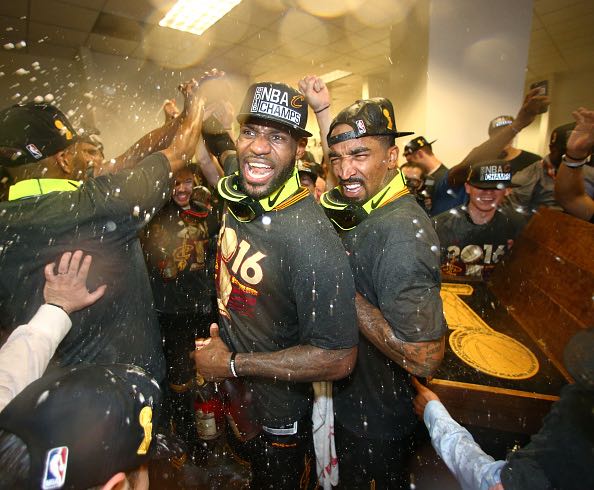 OAKLAND, CA - JUNE 19: LeBron James #23 of the Cleveland Cavaliers and J.R. Smith #5 of the Cleveland Cavaliers celebrates after winning Game Seven of the 2016 NBA Finals against the Golden State Warriors on June 19, 2016 at Oracle Arena in Oakland, California. NOTE TO USER: User expressly acknowledges and agrees that, by downloading and or using this photograph, user is consenting to the terms and conditions of Getty Images License Agreement. Mandatory Copyright Notice: Copyright 2016 NBAE (Photo by Nathaniel S. Butler/NBAE via Getty Images)