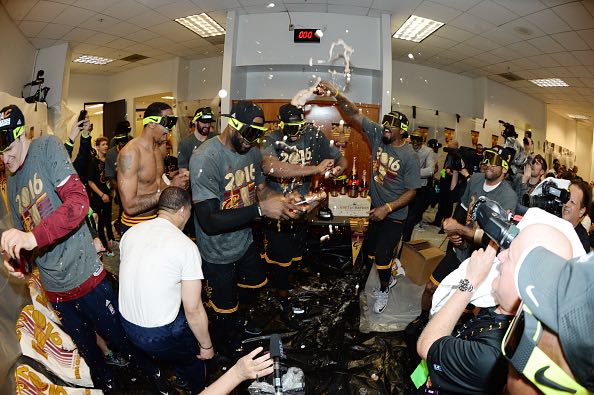 OAKLAND, CA - JUNE 19: LeBron James #23 of the Cleveland Cavaliers celebrates with his teammates after winning Game Seven of the 2016 NBA Finals against the Golden State Warriors on June 19, 2016 at ORACLE Arena in Oakland, California. NOTE TO USER: User expressly acknowledges and agrees that, by downloading and/or using this Photograph, user is consenting to the terms and conditions of the Getty Images License Agreement. Mandatory Copyright Notice: Copyright 2016 NBAE (Photo by Andrew D. Bernstein/NBAE via Getty Images)