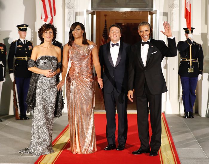 President Barack Obama and first lady Michelle Obama pose for a photo as they greet Italian Prime Minister Matteo Renzi and his wife Agnese Landini on the North Portico for a State Dinner at the White House in Washington, Tuesday, Oct. 18, 2016. (AP Photo/Pablo Martinez Monsivais)