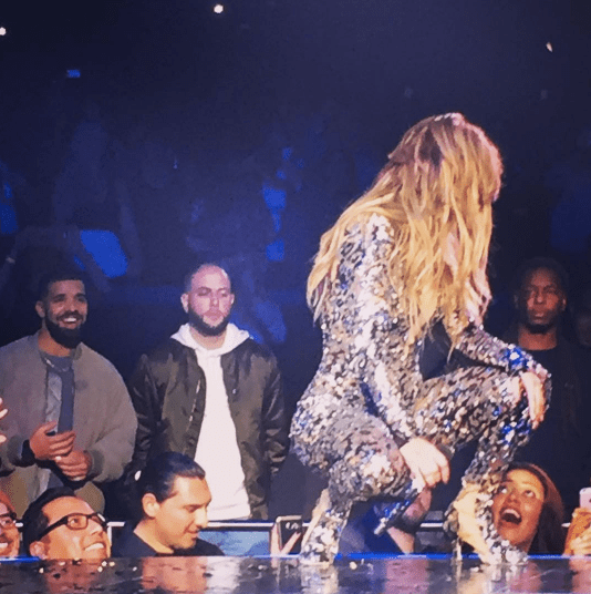 Drake looks at Jennifer Lopez