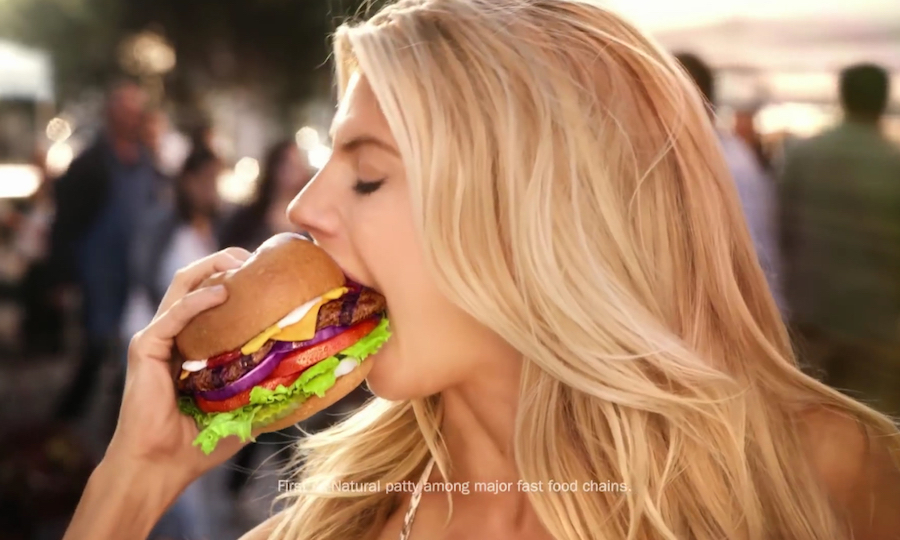 Charlotte McKinney in a commercial for Carl's Jr.
