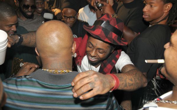 Lil Wayne stunned by $1 million birthday gift Birthday boy LIL WAYNE was left stunned when mentor and pal BIRDMAN handed him $1 million (GBP540,000) at his 26th birthday party in Miami, Florida on Tuesday night (07Oct08). Stars like DJ Khaled and Akon looked on in amazement as the Got Money hitmaker opened a briefcase Birdman handed him and discovered it was full of crisp new bills. A stunned party guest says, "Lil Wayne was left speechless. He was almost in tears when he hugged his friend. I mean, who wouldn't like $1 million as a birthday gift?" The Club Mansion bash was a lavish affair all round - one of the party's main attractions was an ice sculpture full of frozen $100 bills. Lil Wayne hugs Birdman after receiving a million dollars as a birthday present Rapper Lil Wayne celebrates his birthday at Club Mansion Miami, Florida - 07.10.08 Featuring: Lil Wayne stunned by $1 million birthday gift Where: United States When: 07 Oct 2008 Credit: WENN