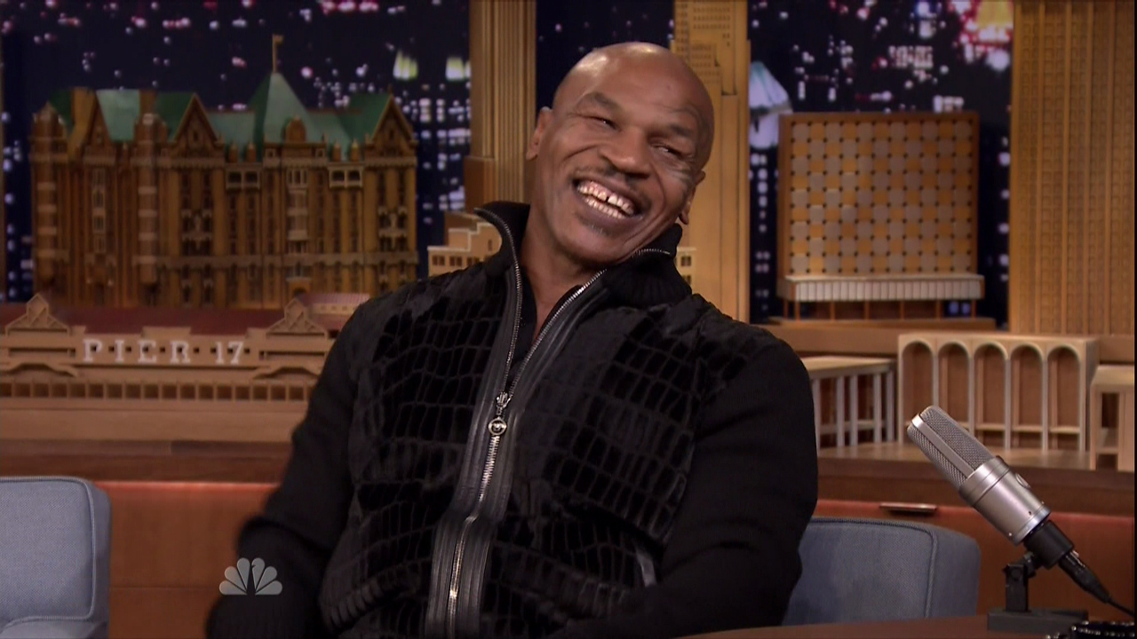 Mike Tyson during an appearance on NBC's 'The Tonight Show' Starring Jimmy Fallon. Mike talks about the new season 'Mike Tyson Mysteries' Mike shows a physical display of excitement. Featuring: Mike Tyson Where: United States When: 27 Oct 2015 Credit: Supplied by WENN.com **WENN does not claim any ownership including but not limited to Copyright, License in attached material. Fees charged by WENN are for WENN's services only, do not, nor are they intended to, convey to the user any ownership of Copyright, License in material. By publishing this material you expressly agree to indemnify, to hold WENN, its directors, shareholders, employees harmless from any loss, claims, damages, demands, expenses (including legal fees), any causes of action, allegation against WENN arising out of, connected in any way with publication of the material.**