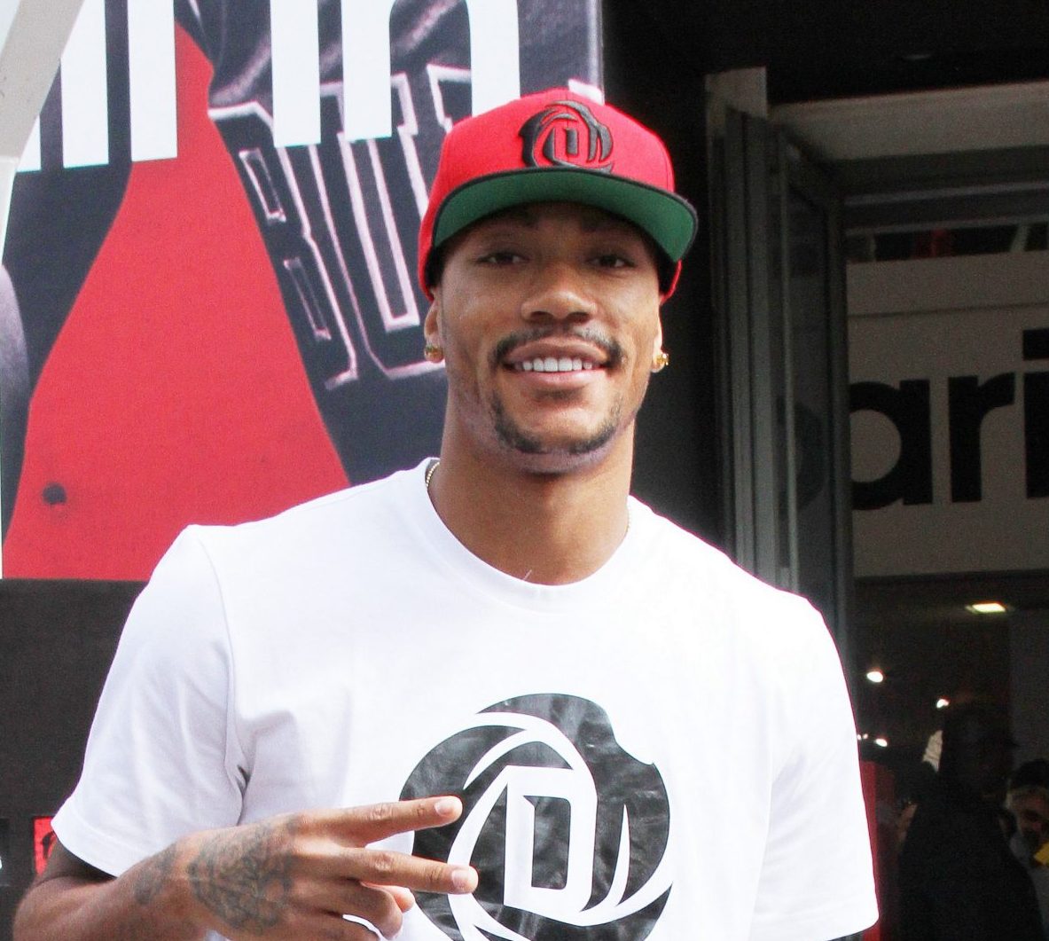 Chicago Bulls player Derrick Rose attends an in-store Adidas promotional event near Champs Elysees