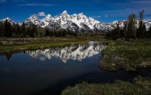 Reflected Teton mountain range in the Morning