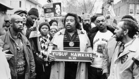The Rev. Al Sharpton (c.) flanked by Diane Hawkins and Moses