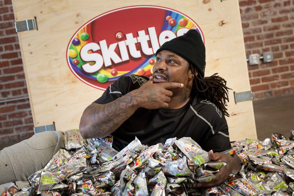 WATCH: Marshawn Lynch unveils his very own Skittles packs