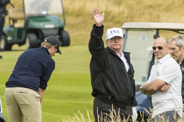 President Donald Trump spotted playing golf