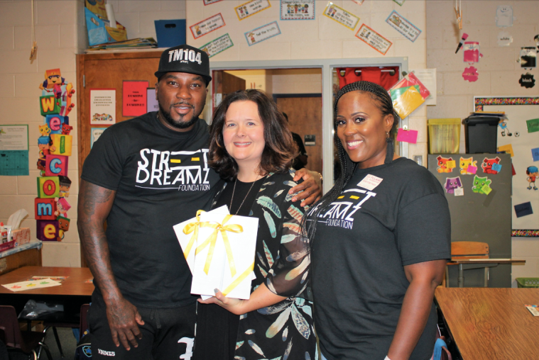Jeezy gives ipads out at Pulaski Elementary.