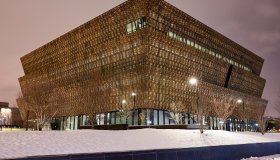 Facade of the new 'National Museum of African American History and culture' at night