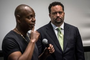 Comedian Dave Chappelle, left, stumps with childhood friend and former NAACP president Ben Jealous, right, at an early voting rally at Morgan State University in Baltimore, Maryland...