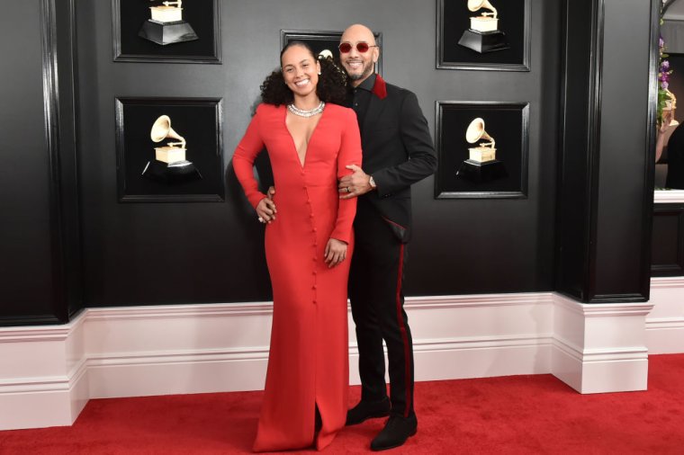 Swizz Beatz and Alicia Keys match each other's fly.
