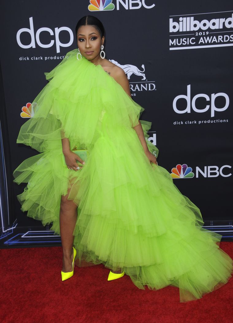 Yung Miami wore lime green from head to toe.