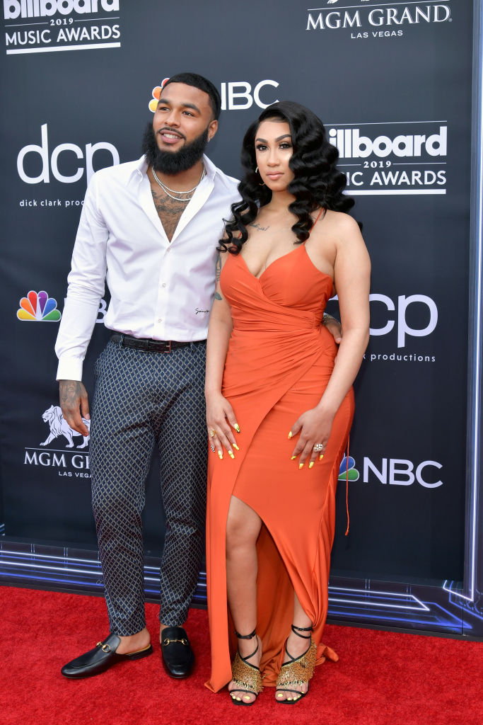 Queen Naija and Clarence White clean up nice.