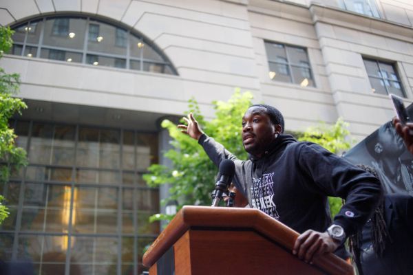 Rapper Meek Mill addresses a rally outside the courthouse...