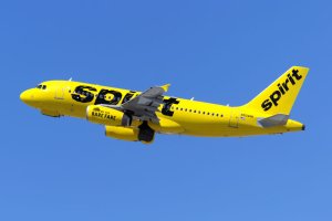 A Spirit Airlines Airbus 319 takes off from Los Angeles at...