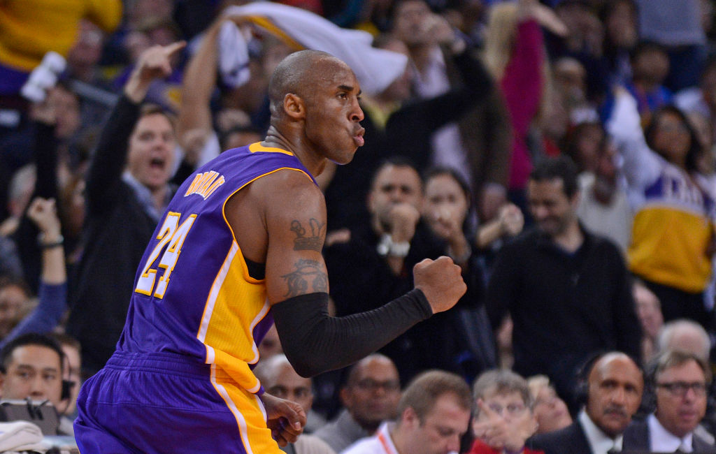 Los Angeles Lakers' Kobe Bryant (24) pumps his fist after sinking a three-pointer in overtime against the Golden State Warriors during their game at Oracle Arena in Oakland, Calif. on Saturday, Dec. 22, 2012. Los Angeles defeated Golden State 118-115 in o