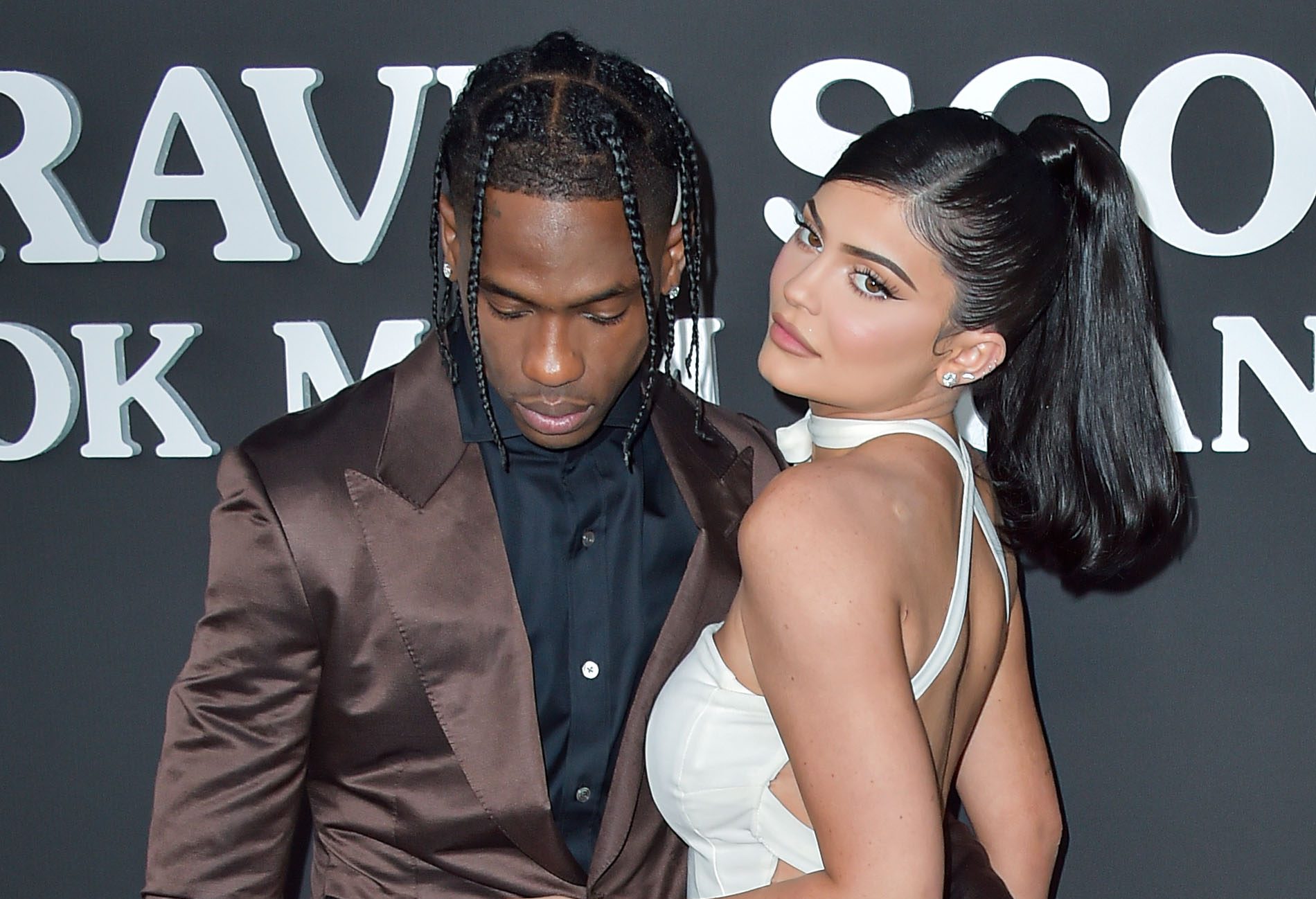Rapper Travis Scott and girlfriend/television personality Kylie Jenner arrive at the Los Angeles Premiere Of Netflix's 'Travis Scott: Look Mom I Can Fly' held at Barker Hangar on August 27, 2019 in Santa Monica, Los Angeles, California, United States.