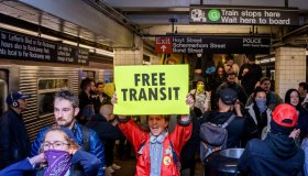 Hundreds of protesters took over a subway platform in...