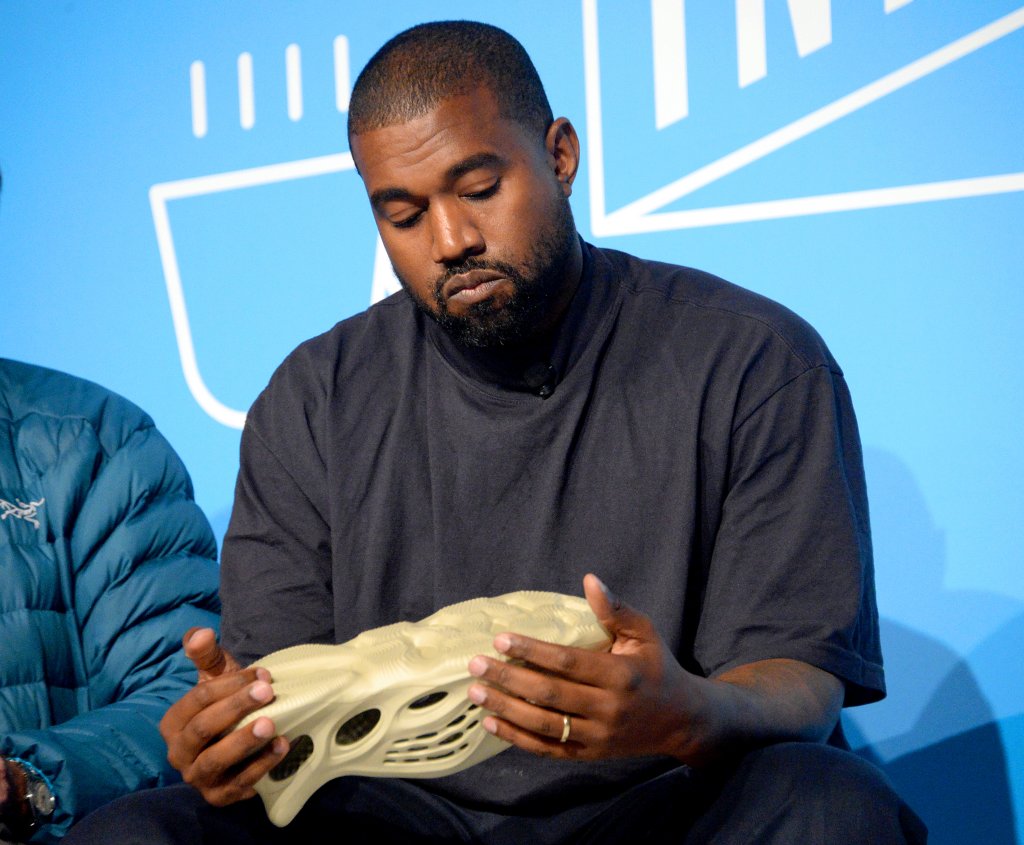 Kanye West Yeezy Adidas sell donate charity sneakers