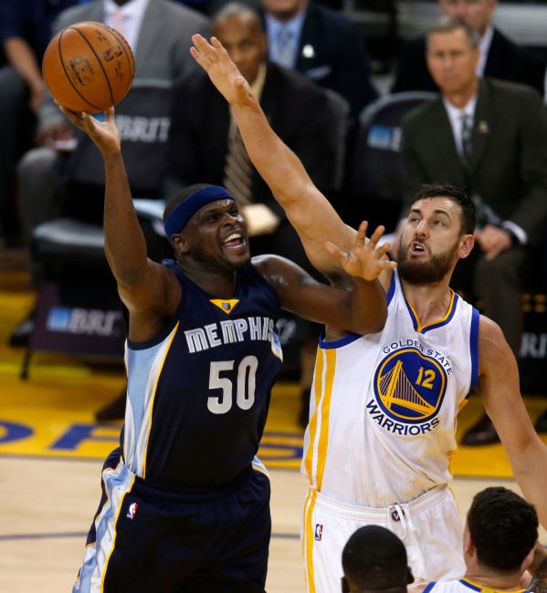 Memphis Grizzlies' Zach Randolph (50) takes a shot against Golden State Warriors' Andrew Bogut (12) in the first quarter at Oracle Arena in Oakland, Calif., on Wednesday, April 13, 2016. (Nhat V. Meyer/Bay Area News Group)