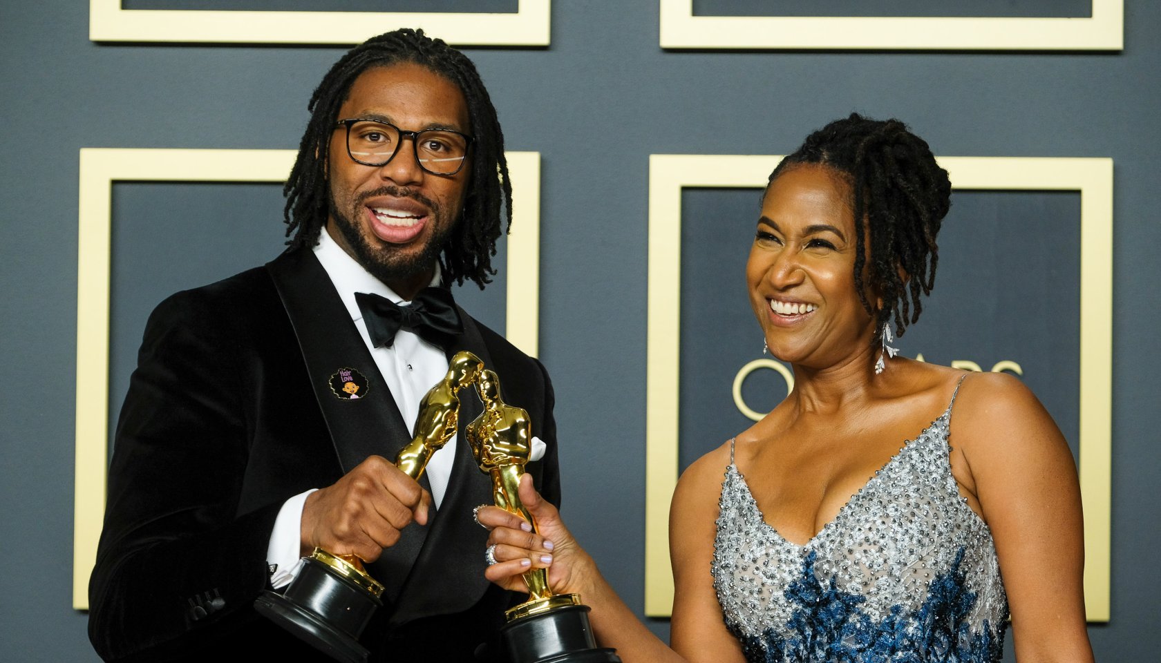 Matthew A. Cherry & Karen Rupert Toliver poses with the Oscar for Short Film (Animated) in the film Hair Love during the the 92nd Academy Awards, 2020 on Sunday 9 February 2020