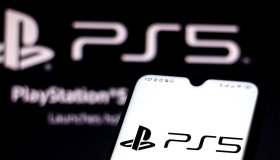 In this photo illustration the PlayStation 5 logo seen...