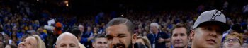 Canadian rapper Drake winks to the camera while attending the Golden State Warriors vs. San Antonio Spurs game at Oracle Arena in Oakland, Calif., on Monday, Jan. 25, 2016. (Jose Carlos Fajardo/Bay Area News Group)