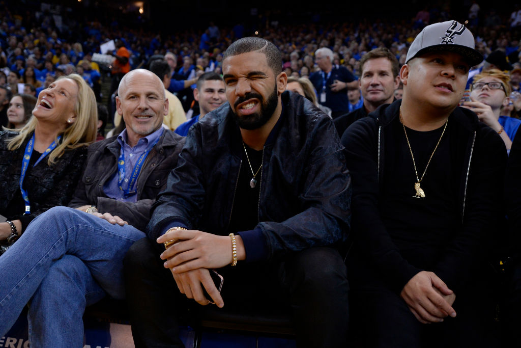 Canadian rapper Drake winks to the camera while attending the Golden State Warriors vs. San Antonio Spurs game at Oracle Arena in Oakland, Calif., on Monday, Jan. 25, 2016. (Jose Carlos Fajardo/Bay Area News Group)