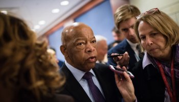 Rep. John Lewis (Ga.), the civil rights icon, was chosen to deliver the final seconding speech for Pelosi. He is pictured leaving a closed door meeting at Capitol Visitor Center Auditorium Wednesday morning to nominate a speaker and choose other members of