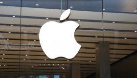Apple's logo on its store window in London, UK...