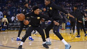 Golden State Warriors' Quinn Cook (4) warms up with teammate Kevin Durant (35) before their NBA game against the Brooklyn Nets at the Oracle Arena in Oakland, Calif. on Saturday, Nov. 10, 2018. (Jose Carlos Fajardo/Bay Area News Group)