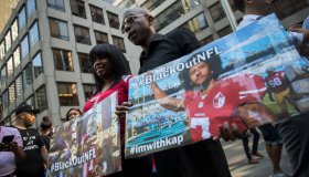 Rally In Support Of NFL Quarterback Colin Kaepernick Outside The League's HQ In New York