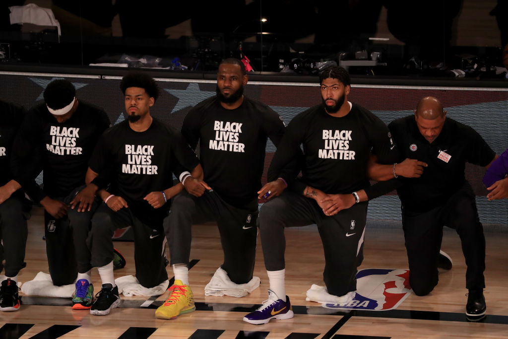 LeBron James & Other NBA Superstars Kneel During National Anthem