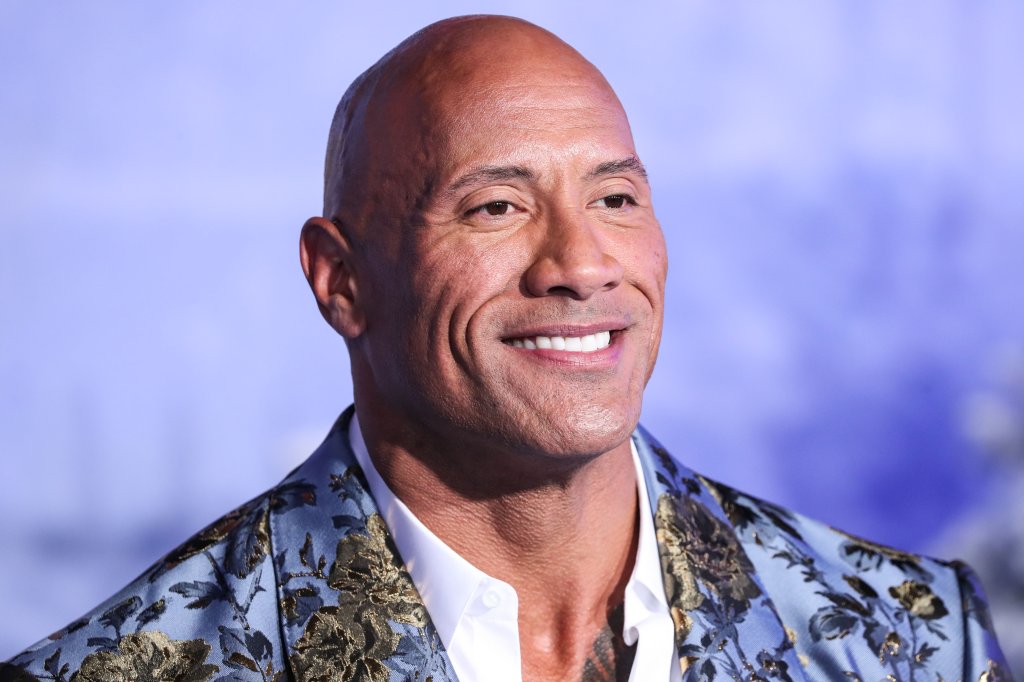 Actor Dwayne Johnson (The Rock) wearing Dolce & Gabbana arrives at the World Premiere Of Columbia Pictures&apos; &apos;Jumanji: The Next Level&apos; held at the TCL Chinese Theatre IMAX on December 9, 2019 in Hollywood, Los Angeles, California, United