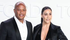 Dr. Dre and Nicole Young arrive at the Tom Fo...