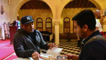 Daymond John signs copies of his new book at Coral Gables Congregational Church