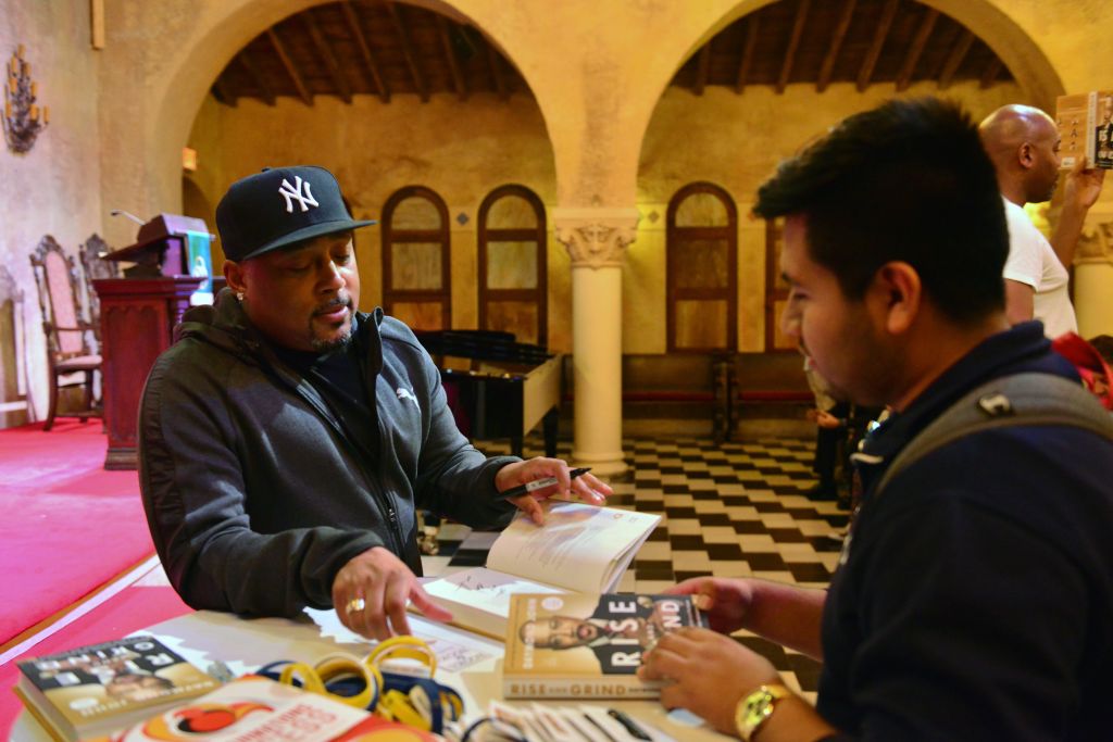Daymond John signs copies of his new book at Coral Gables Congregational Church