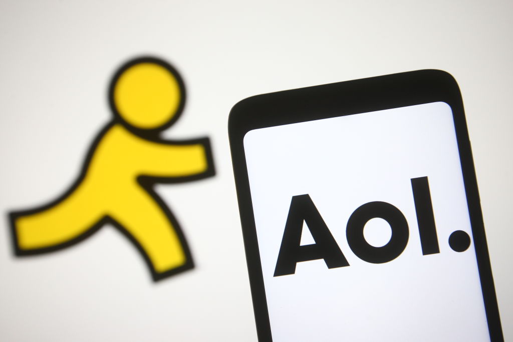 In this photo illustration, AOL logo is seen on a smartphone...