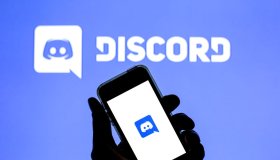 In this photo illustration a Discord logo in seen displayed...