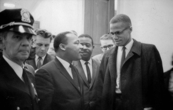 Martin Luther King Jr and Malcolm X waiting for a press conference