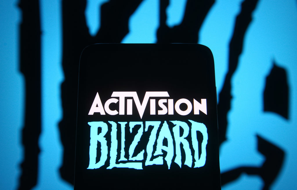In this photo illustration, Activision Blizzard logo of a...