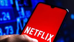 In this photo illustration the Netflix logo seen displayed...