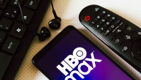In this photo illustration, the logo of the HBO Max, a video...