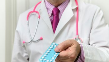Doctor advising about birth control pills