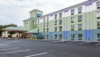 Florida, Orlando, Best Western hotel exterior with empty parking lot due to Covid 19