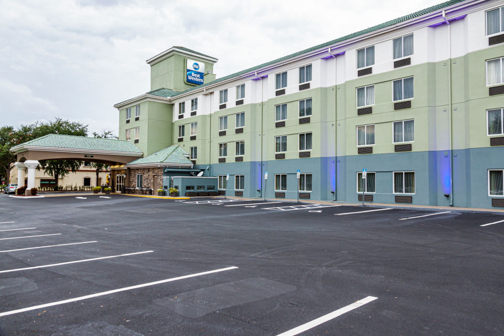 Florida, Orlando, Best Western hotel exterior with empty parking lot due to Covid 19