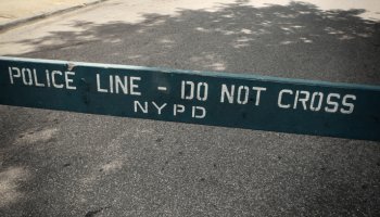 "Police Line - Do Not Cross" NYPD fence in the streets of New York City, USA