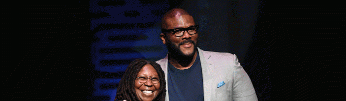 Whoopi Goldberg presents Tyler Perry the Impact Award at the Apollo Theater Spring Benefit